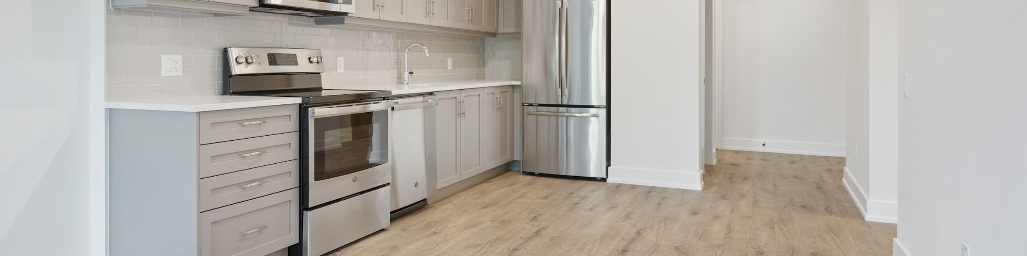 Bright and open kitchen with wood flooring